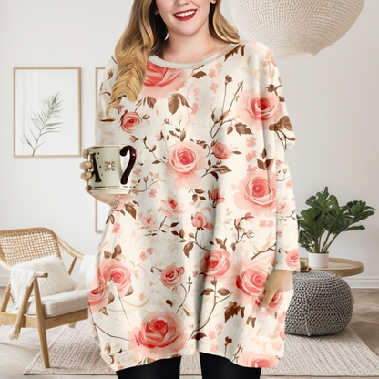 Romantyczna bluzka z okrągłym dekoltem, długimi rękawami i kieszeniami, w różowy kwiatowy wzór