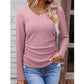 Elegante gebreide damestop met V-hals